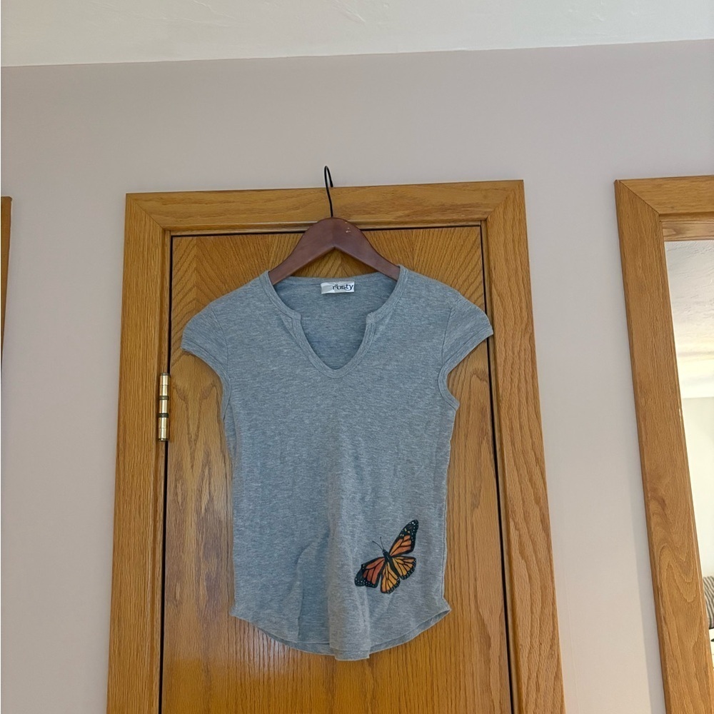 Rusty Gray Top with Orange Butterfly Accent